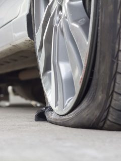 burst flat tire of a car vehicle wheel silver paint sedan, How Long Can A Car Sit On A Flat Tire?