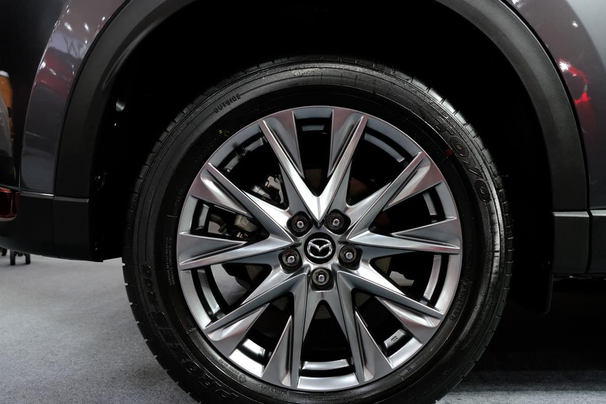 close up Mazda brand tire wheel rims brand new