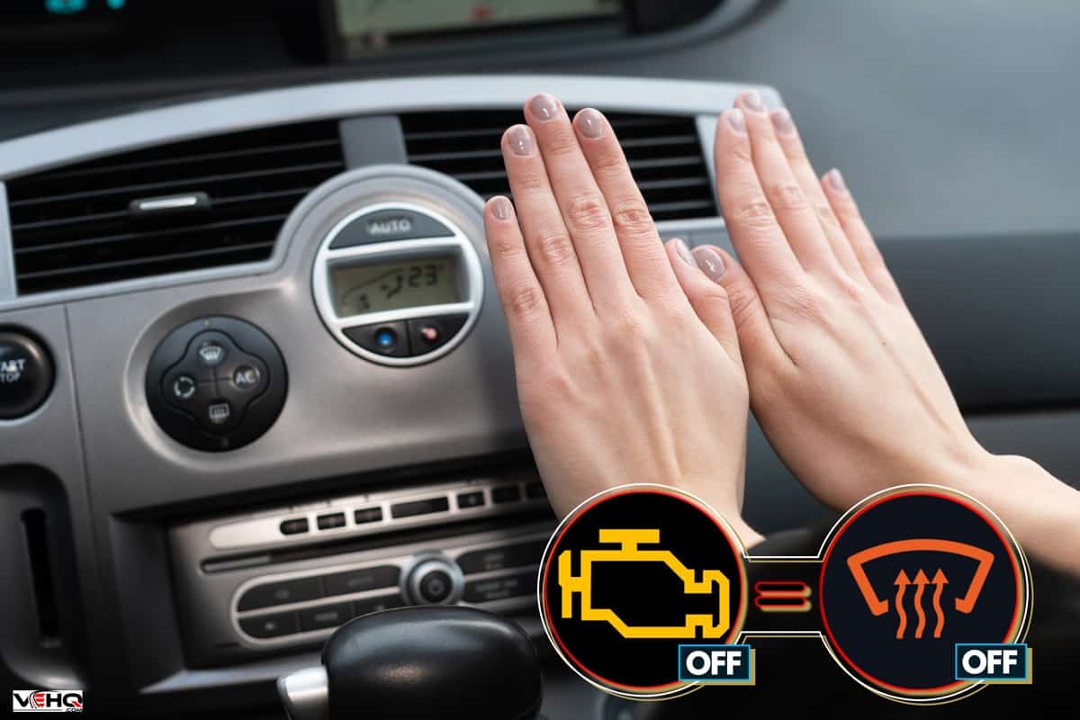 The girl holds her hands over the car's hot air outlet. Cold hands., Does A Car Heater Work With The Engine Off?