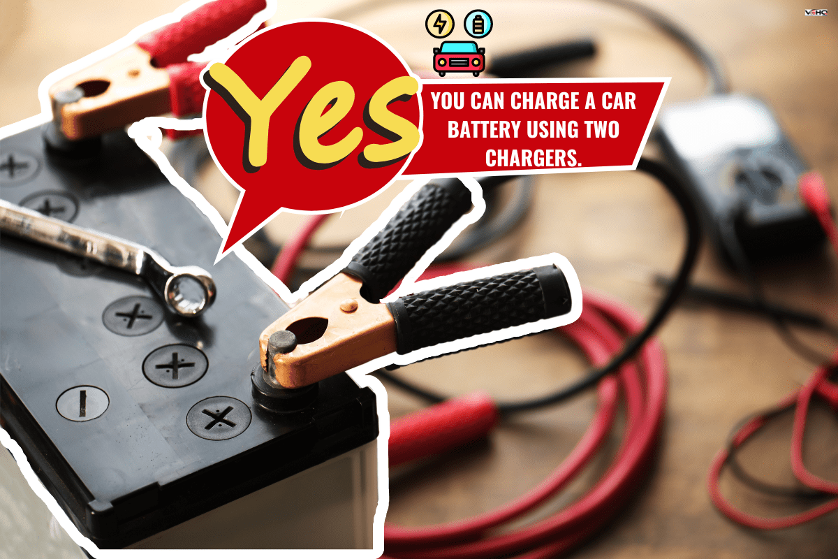 A Car battery with red and black battery Jumper Cables with copper clamps attached to the terminals. - Can You Charge A Car Battery With Two Chargers.
