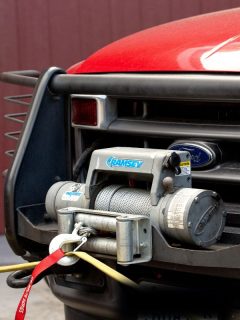 A Ramsey winch system attached to the front end of an emergency vehicle, Can You Power A Winch Through A Trailer Plug?