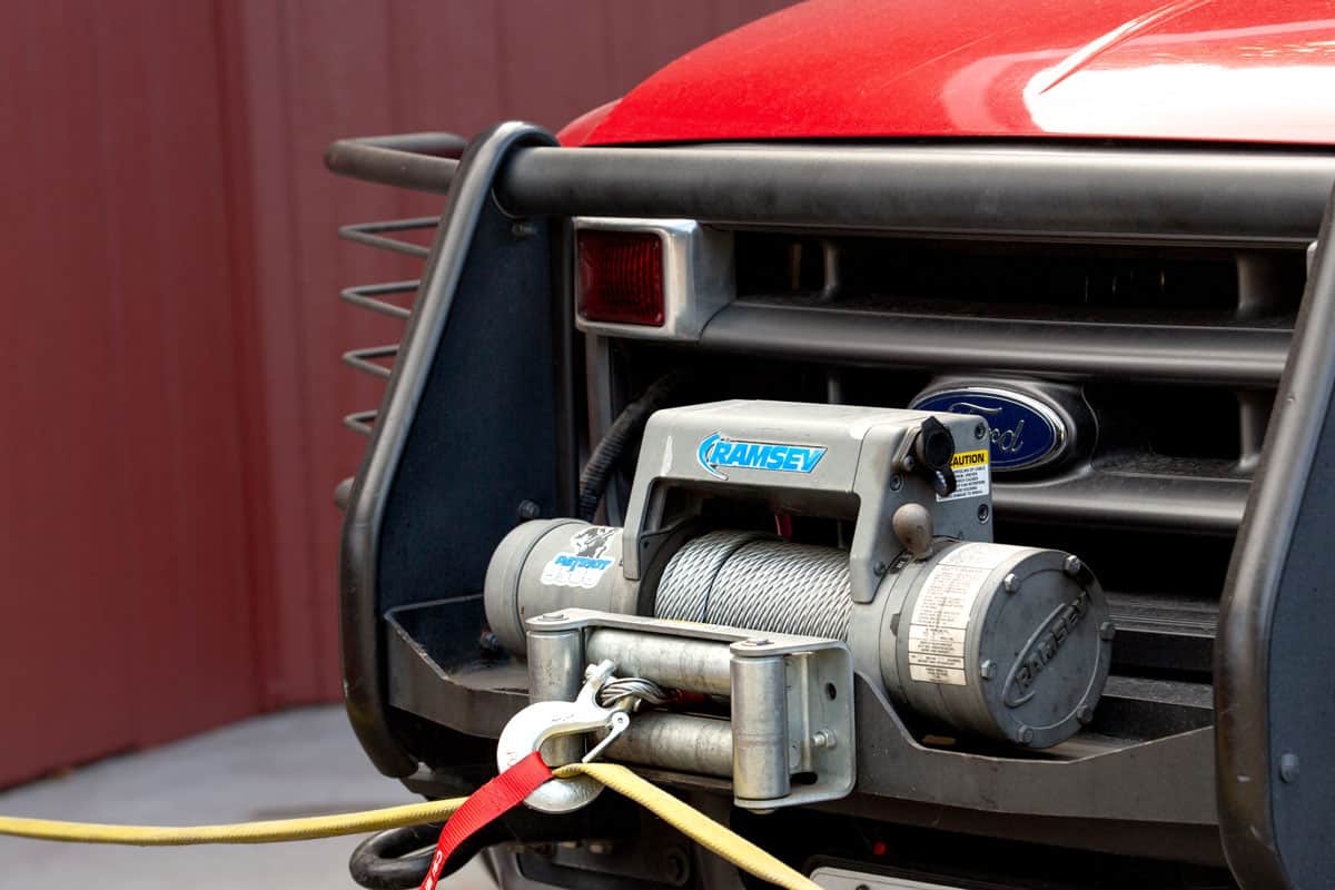 A view of a Ramsey winch system attached to the front end of a Washington State emergency vehicle