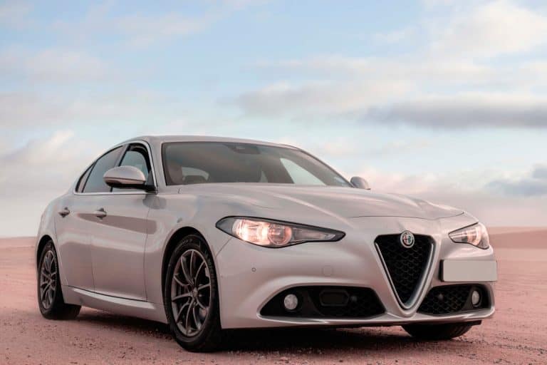 Alfa Romeo Giulia standing in the middle of the desert , Is It Safe To Jack Up One Side Of A Car?