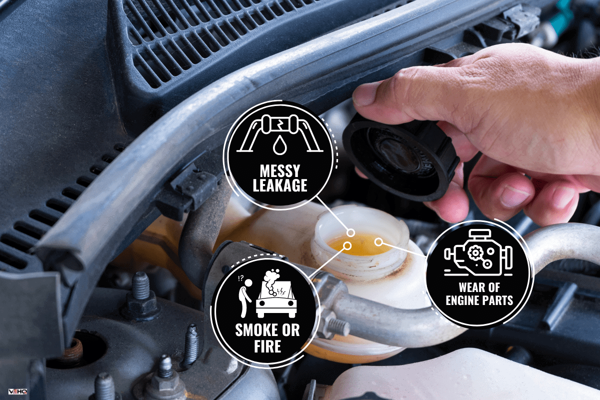 Check brake fluid,Hand open a tank for car maintenance. - Can You Overfill Hydraulic Fluid?