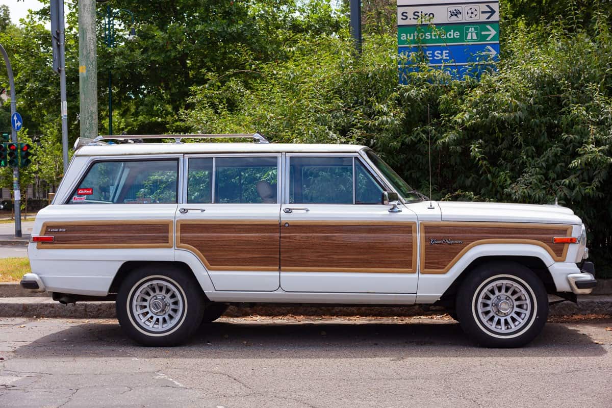 Classic Jeep Grand Wagoneer V8 parked in the Milan street