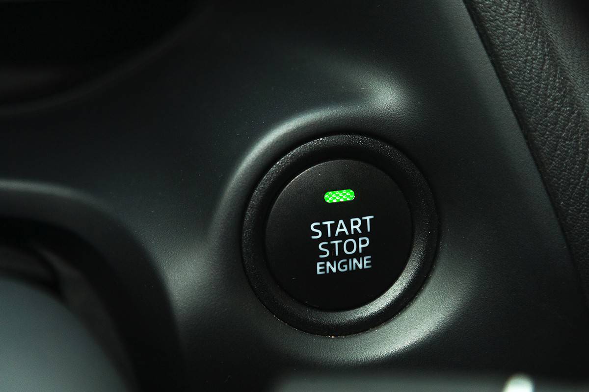 Detail on a black start button in a car