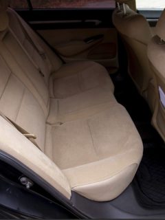 Honda Civic, beige interior design, car passenger and driver seats with seats belt. How To Put Seats Down In A Honda Civic