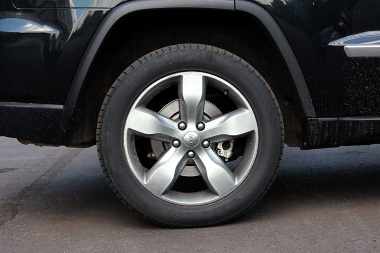 Jeep Cherokee close up wheels rim tires black paint car vehicle suv, What Are The Biggest Tires You Can Put On A Jeep Cherokee Without Lift?