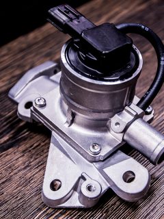 New EGR valve on a wooden table, How Do You Bypass An EGR Valve?