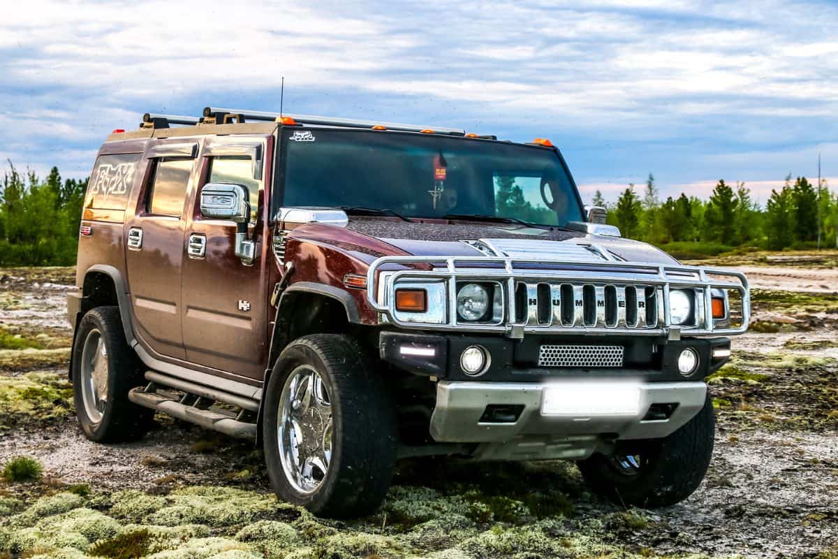 Off-road motor car Hummer H2 at the countryside.