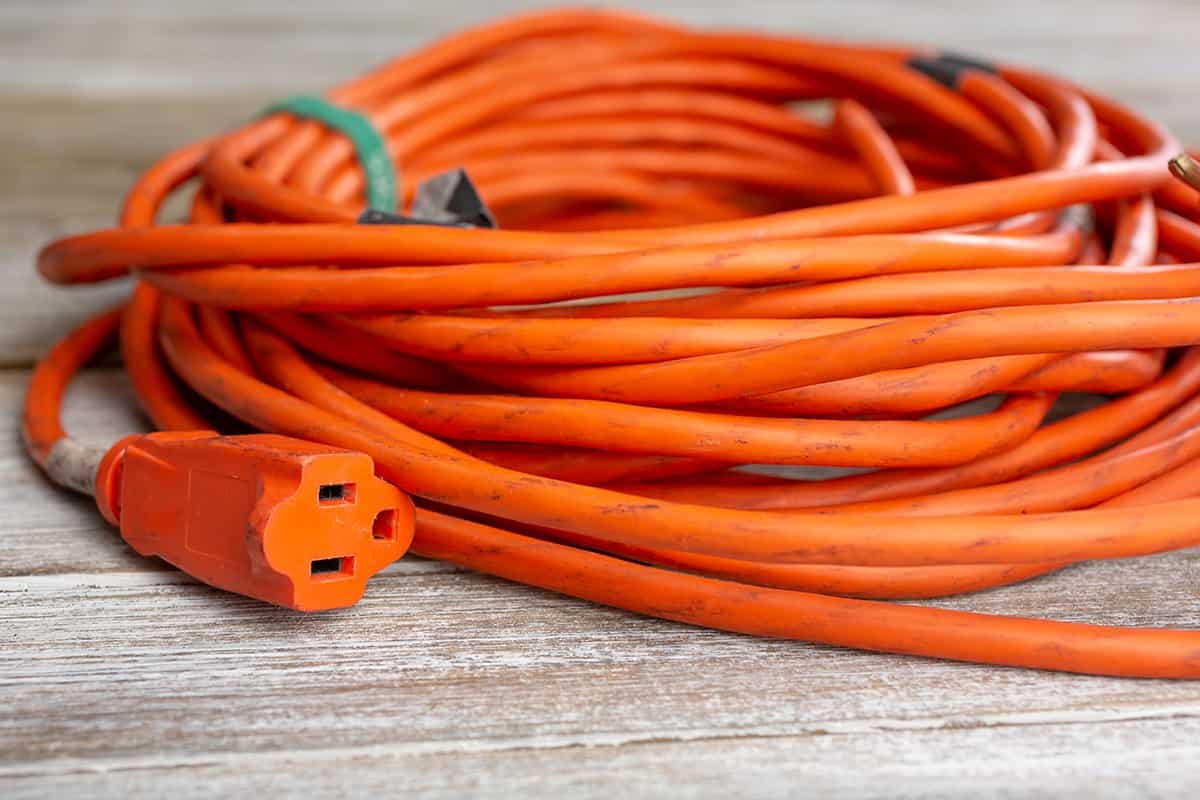 Orange extension cord on the table