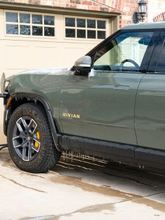 Rivian Electric Truck charging at home with ice cycles and snow from winter storm, Can Rivian Power A House?