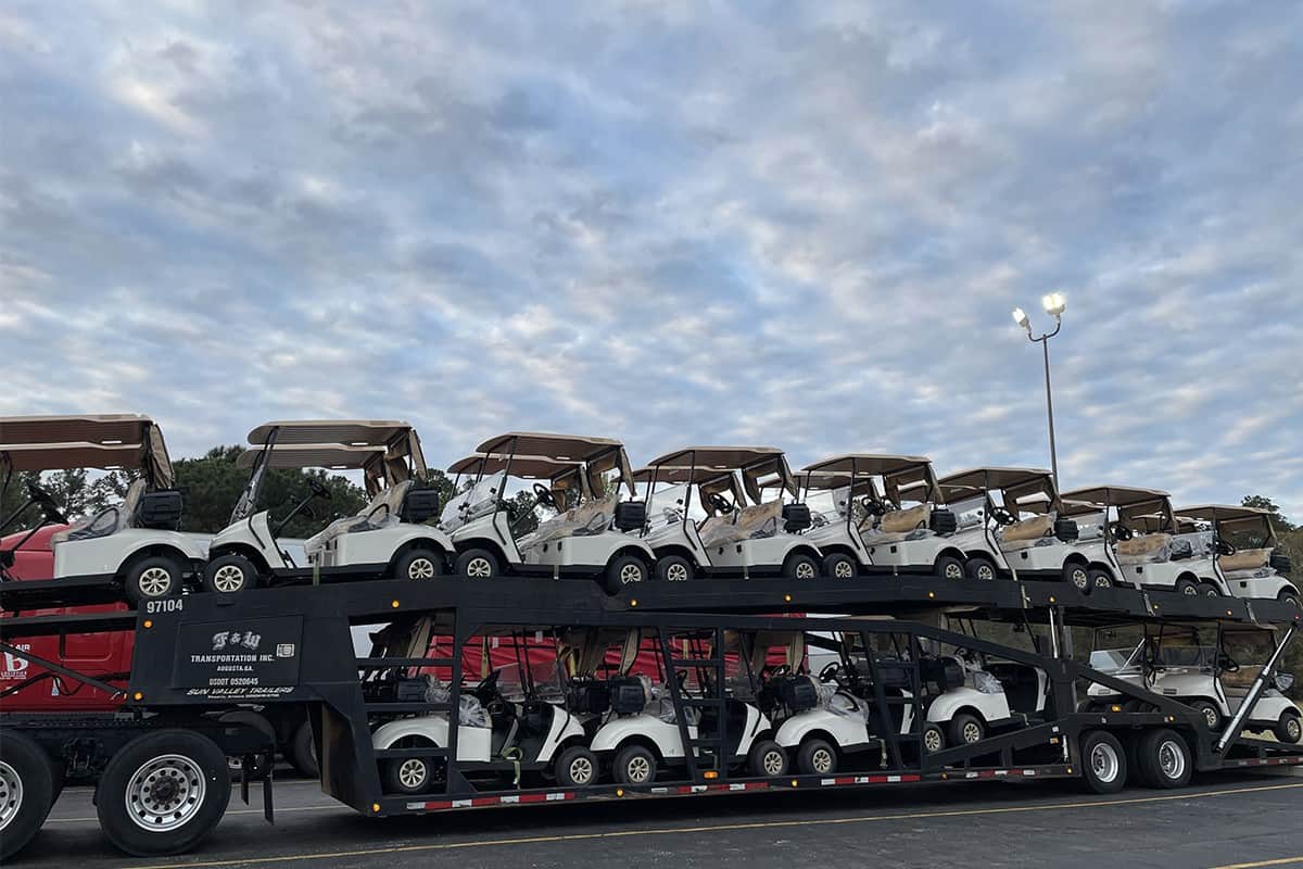 Semi truck with a full load of golf carts