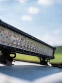 Steamed led bar on off road vehicle close up shot, shallow depth of field, How To Install A Light Bar On Hummer H3