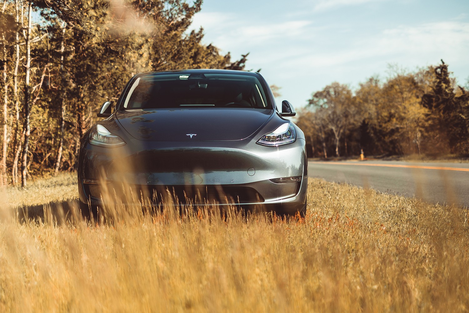 Tesla all new Model Y parked on the side of the road