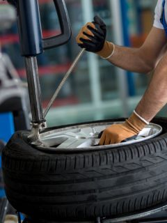Worker changing the tire for a brand new one, What Are The Biggest Tires For 15 Inch Rims?