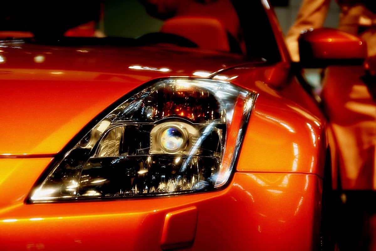 car head light detail Nissan vehicle color orange glossy