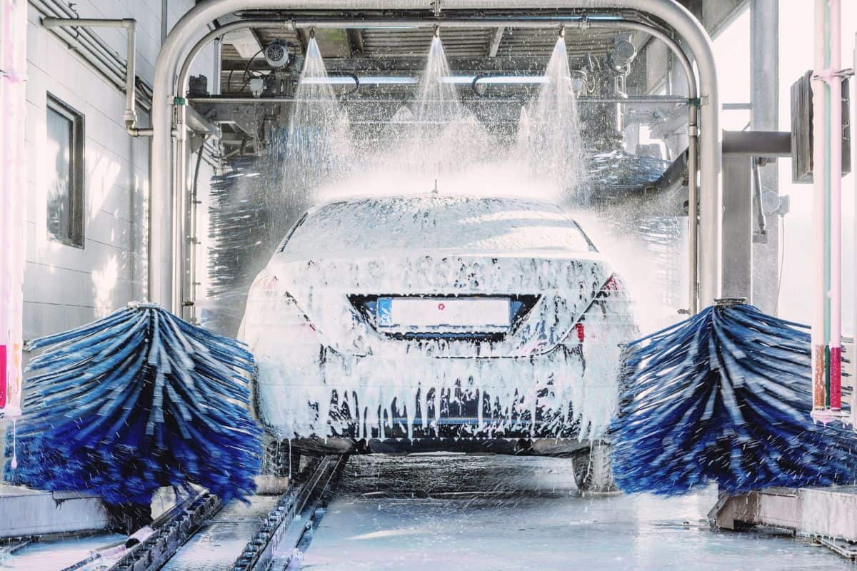 Detail view on automatic car wash using foam water