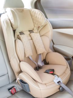 Light children's car seat in a bright leather interior, How To Put A Cosco Car Seat Back Together After Washing