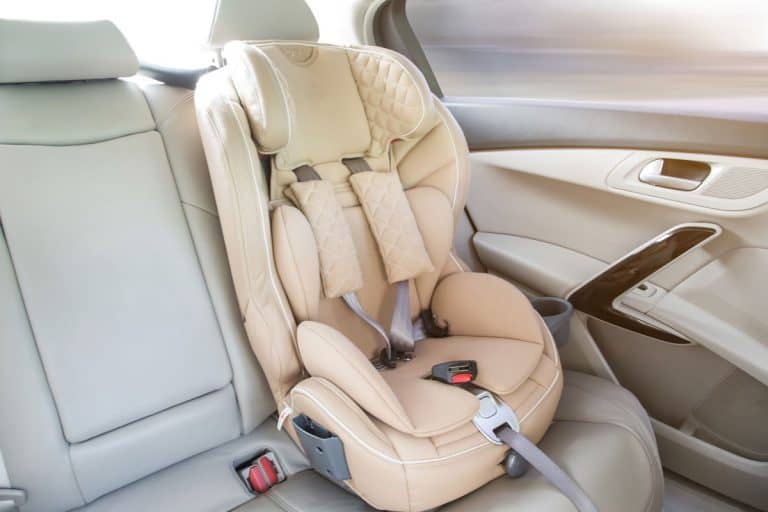 light children's car seat in a bright leather interior, Are All Car Seat Bases The Same? [Are They Interchangeable?]