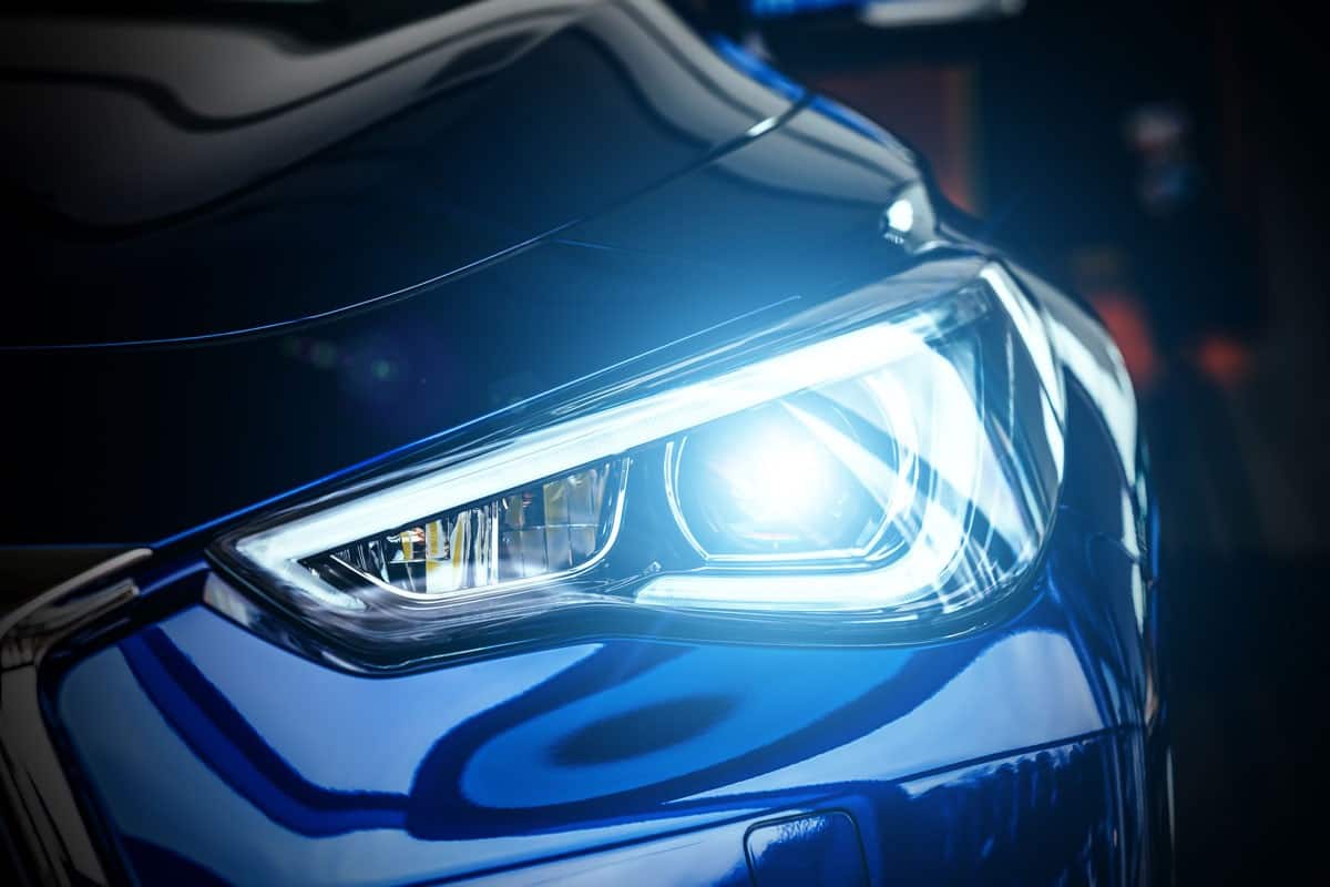 macro view modern blue car xenon bright light