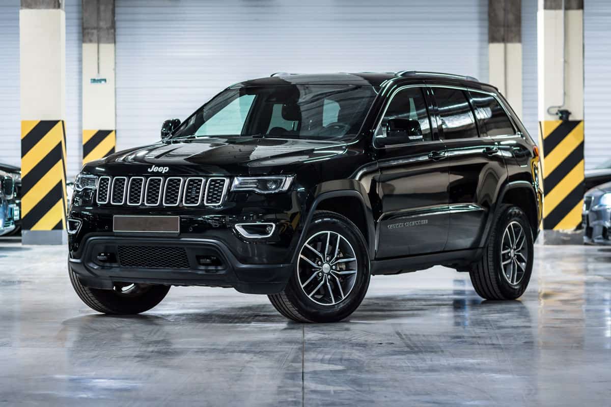 shiny gloss black paint of Jeep cherokee on the indoor parking