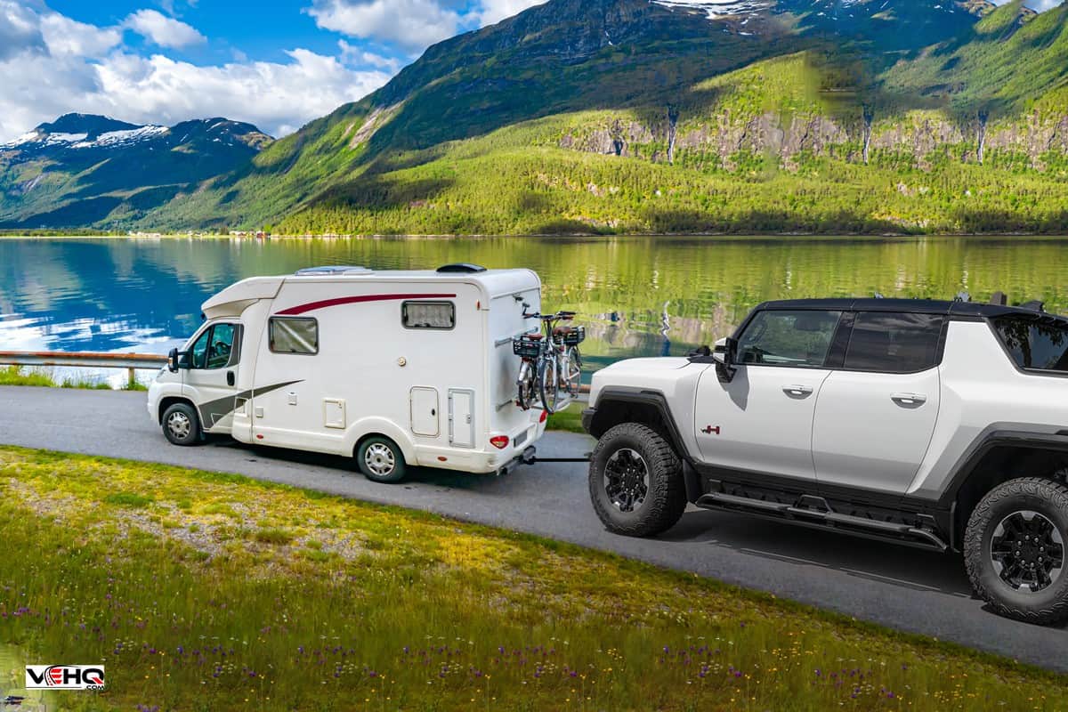 Family vacation travel RV, holiday trip in motorhome, Caravan car Vacation. Beautiful Nature Norway natural landscape towing a hummer, How To Use 4X4 On Hummer