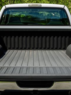 A Ford F150 truck bed left open, Is Custom Coat The Same As Raptor Liner?