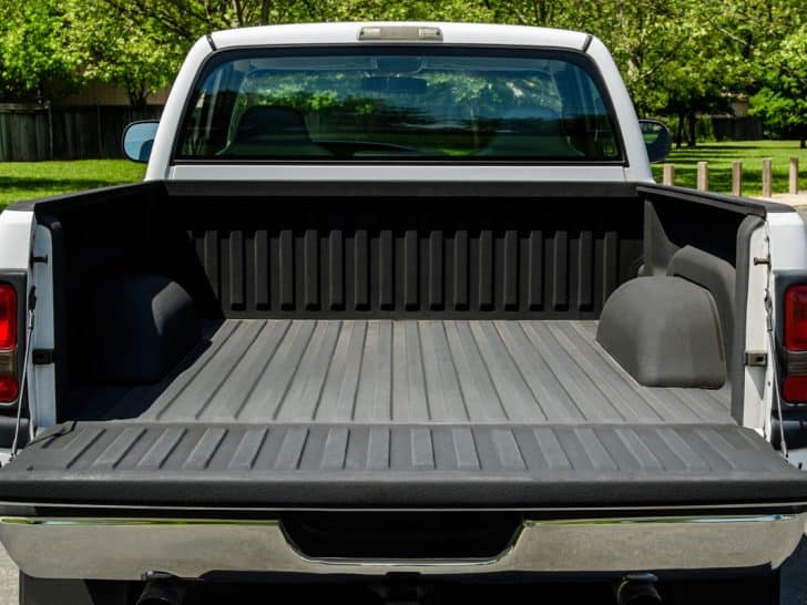 A Ford F150 truck bed left open, Is Custom Coat The Same As Raptor Liner?