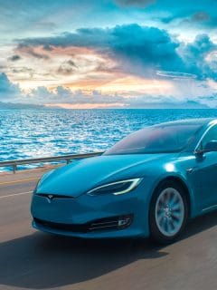 A rare blue coloured tesla model s drives on a beach side abudhabi road., Tesla Model 3 Bottom Cover Loose - What To Do?