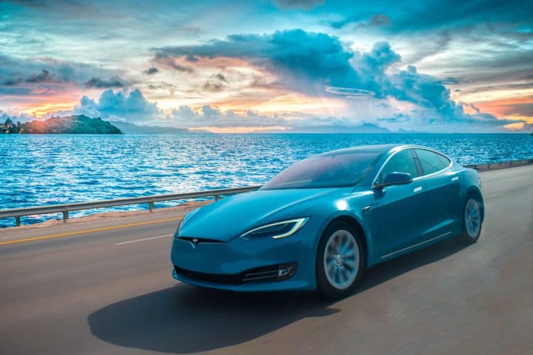A rare blue coloured tesla model s drives on a beach side abudhabi road., Tesla Model 3 Bottom Cover Loose - What To Do?