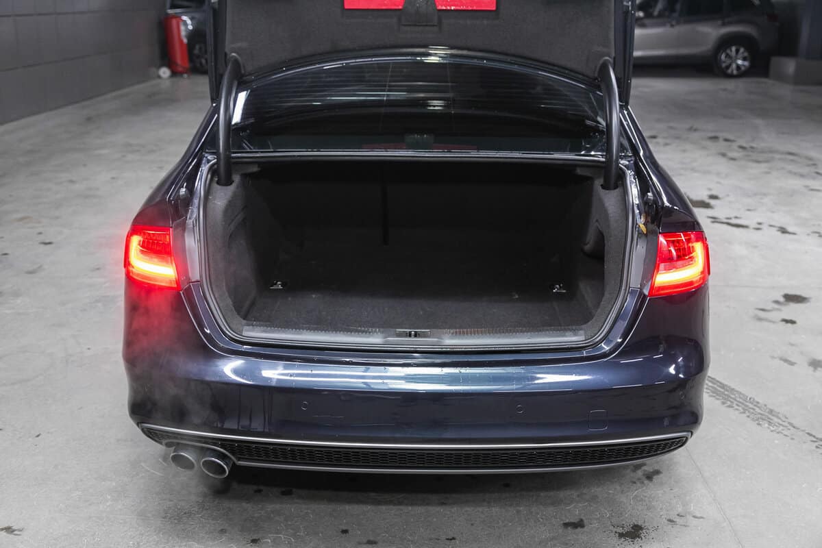 Audi A4, Big trunk open in a sedan car.