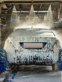 Automatic car wash in action on a plasti-dip car, Can You Go Through A Carwash With A Plasti Dip?