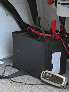Battery in a boat being charged with a small battery charger, How To Reset A Schumacher Battery Charger?