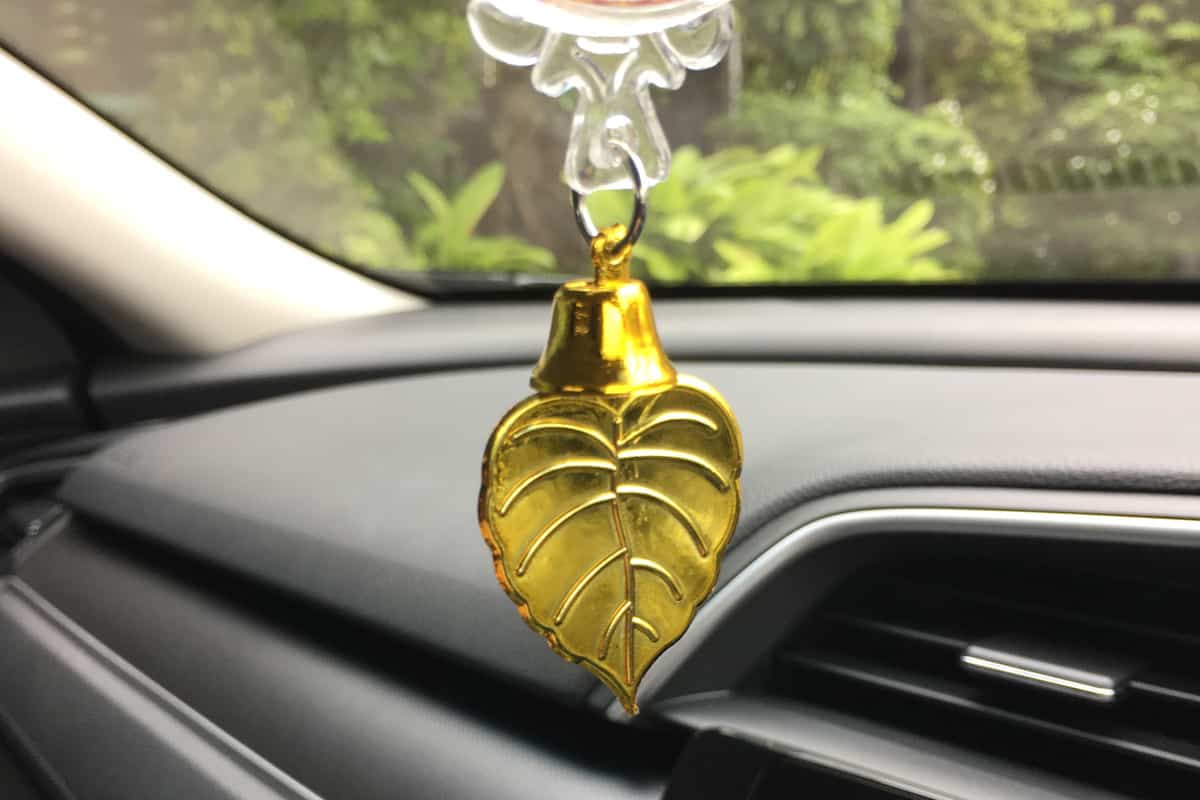 Bell hanging from the front of the car