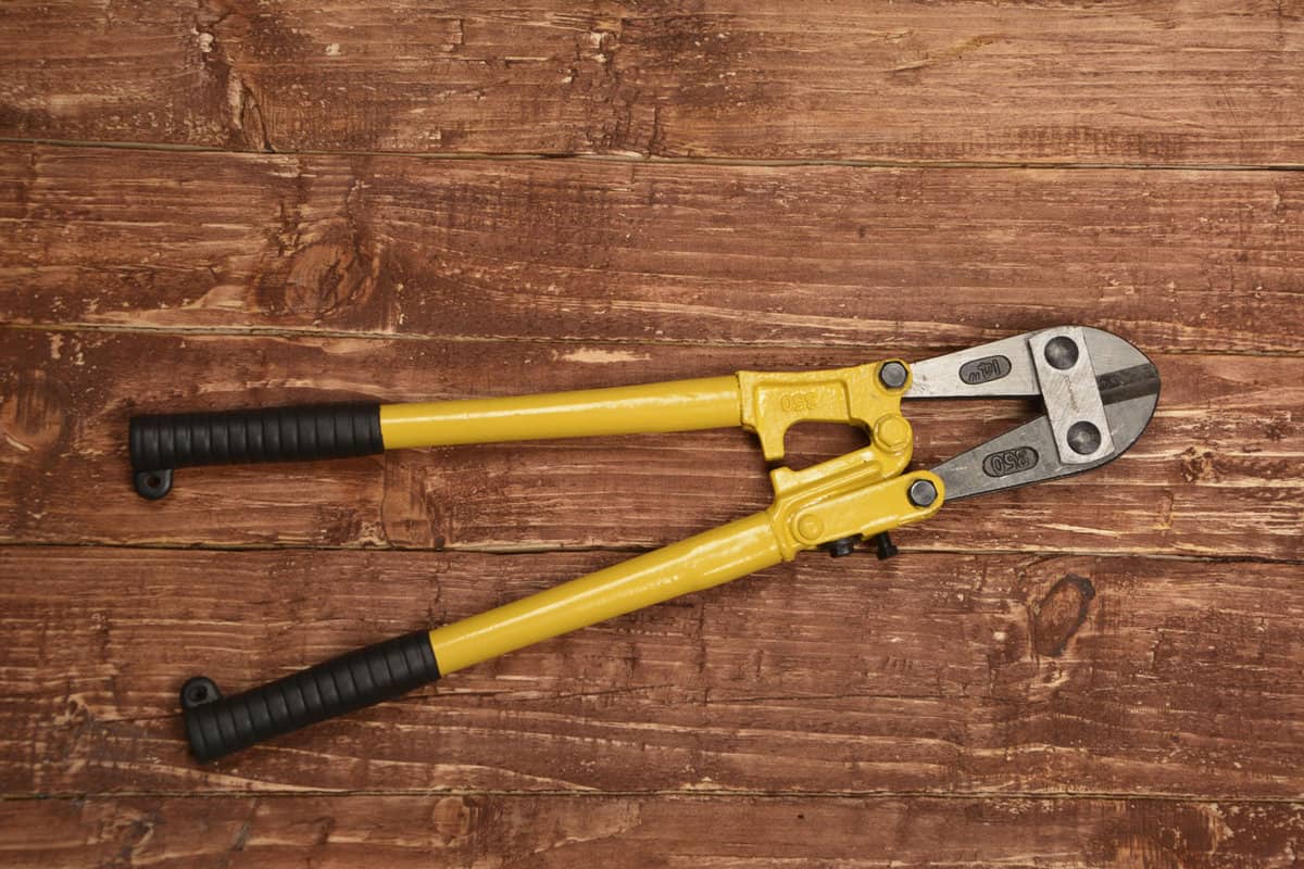 Big heavy duty bolt cutters.A pair of bolt cutters. The markings on the tool are specifications only. No visible brand names