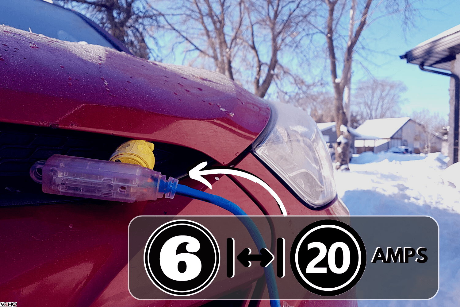 A block heater cable plugged into a vehicle parked in a snowy winter driveway, How Many Amps Does A Block Heater Draw?