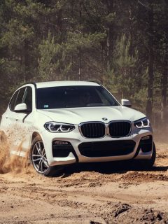 Bmw x3 white color off the road trail sand dusty, How Much Weight Can A BMW Carry [Inc. X5, X3, & X1]?