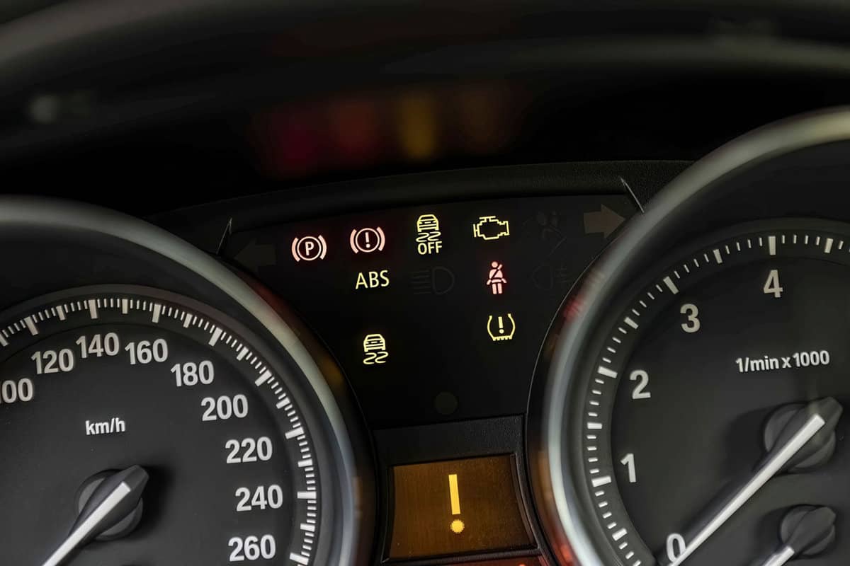 Car warning lights in the dashboard. Car service evocative image 
