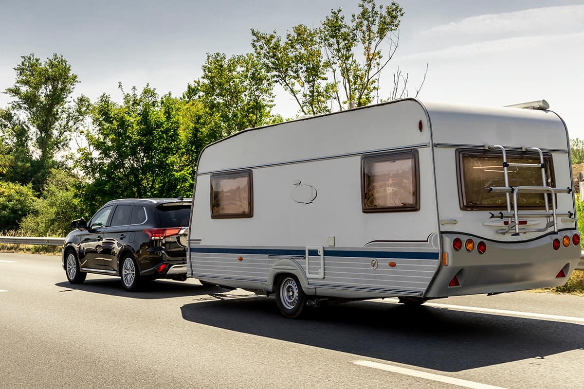 Caravan trailer on a freeway road