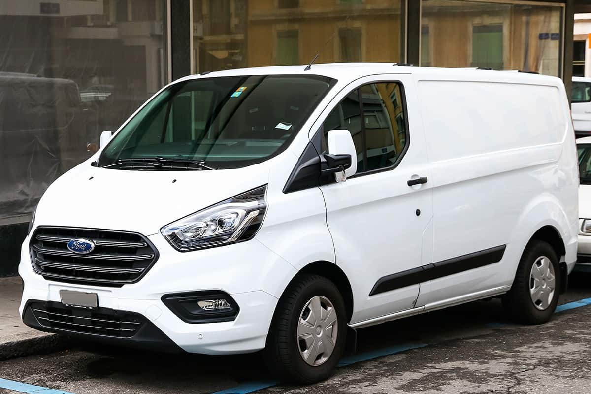 Cargo van ford transit in the city street