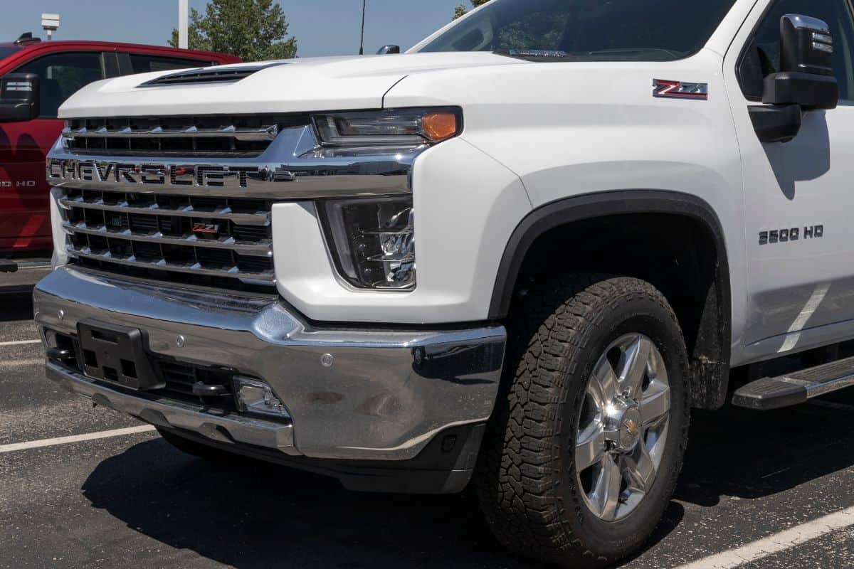 hevrolet Silverado 2500HD display at a dealership. The Chevy Silverado 2500HD is available with gas or diesel engines.