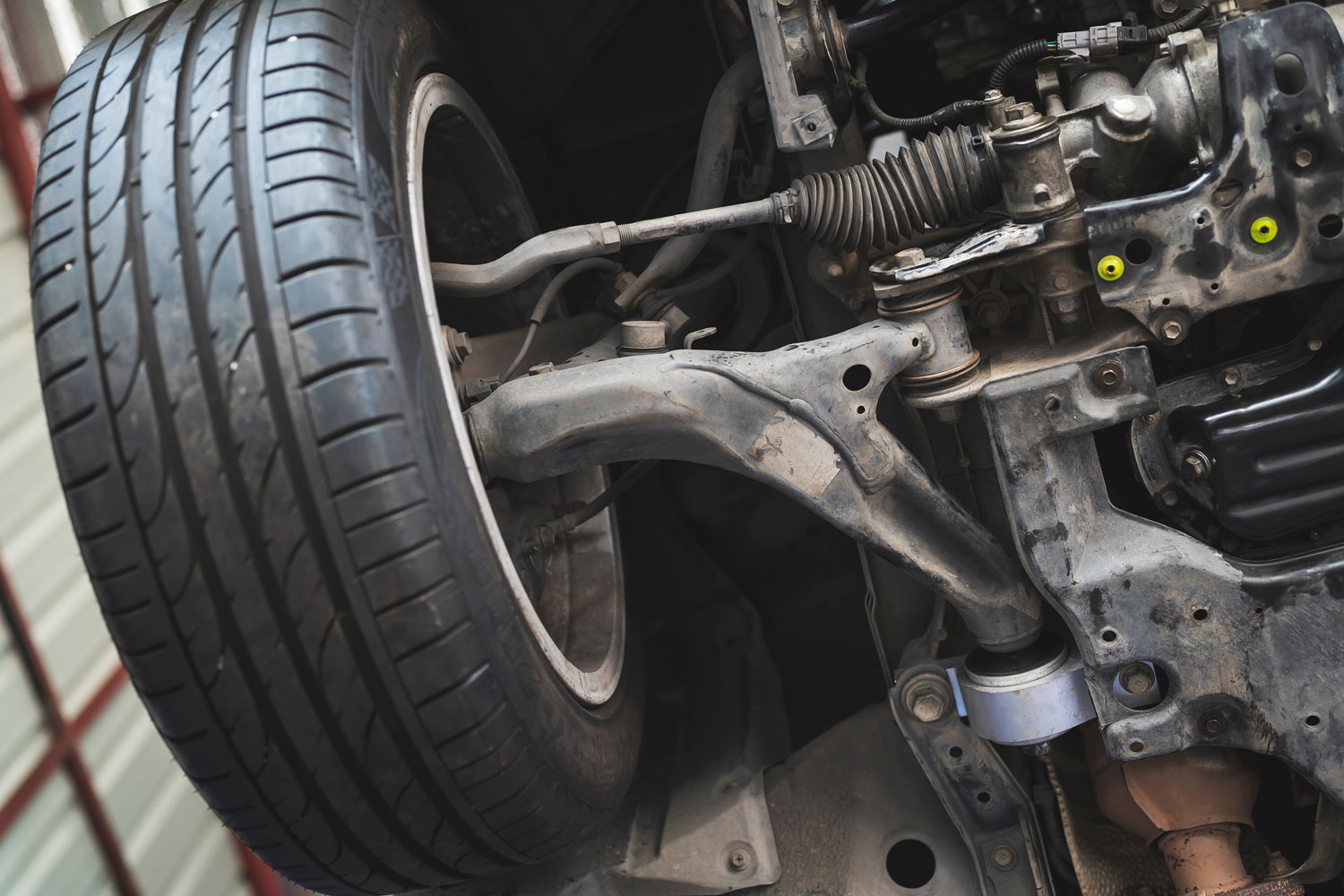 Close-up of car front suspension system components