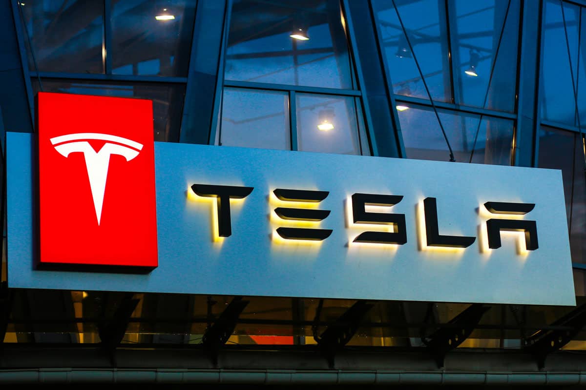 Tesla sign on the building on car sales