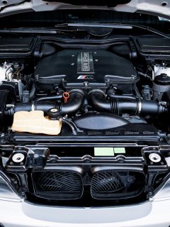 The BMW 5 Series E39 M5 engine bay after cleaning and dressing. Illustration of M Power car engine details. Concept of car detailing and modification, How To Vent Your Engine Bay [Step By Step Guide]?