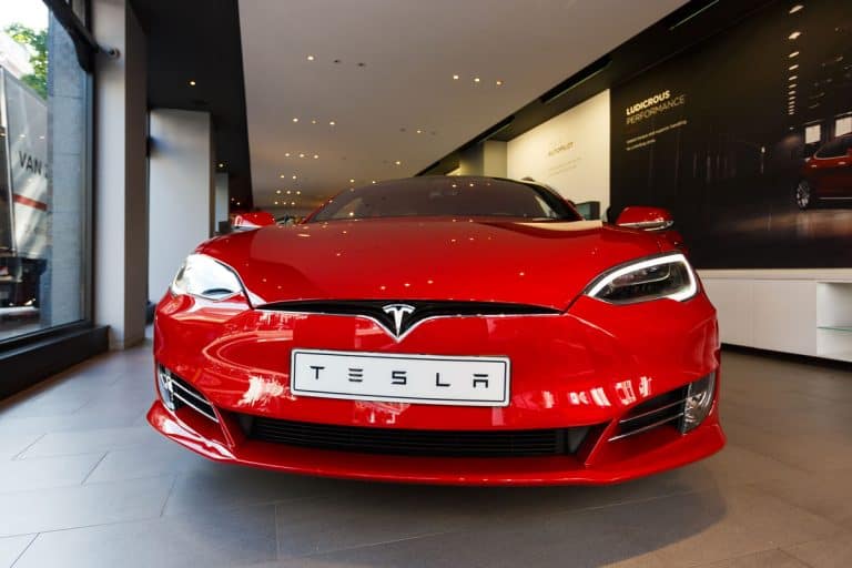 The car of Tesla Model S is exhibited in a store, located on Hobbemastraat street, Does Tesla Have Snow Mode?