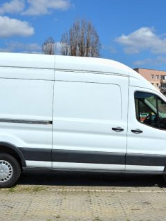 White delivery truck van Ford Transit. - Will A Dirt Bike Fit In A Ford Transit Connect?