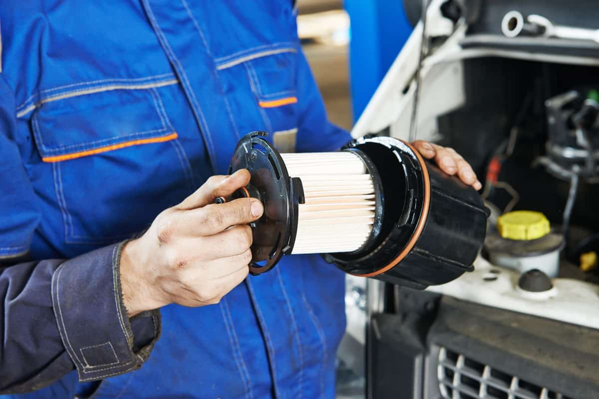 car servicing replacing motor oil fuel