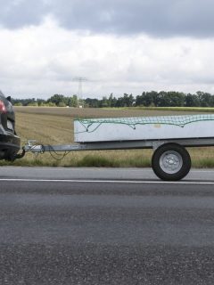 Car pulling trailer on the road, What Are The Torque Specs For A Weight Distribution Hitch?