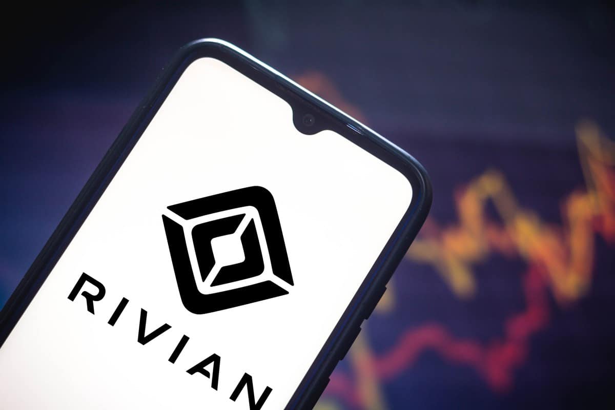 illustration the Rivian logo seen displayed on a smartphone screen